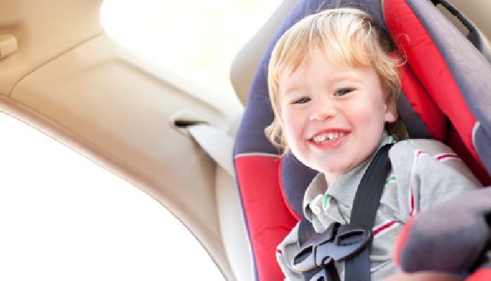 Little boy in car seat